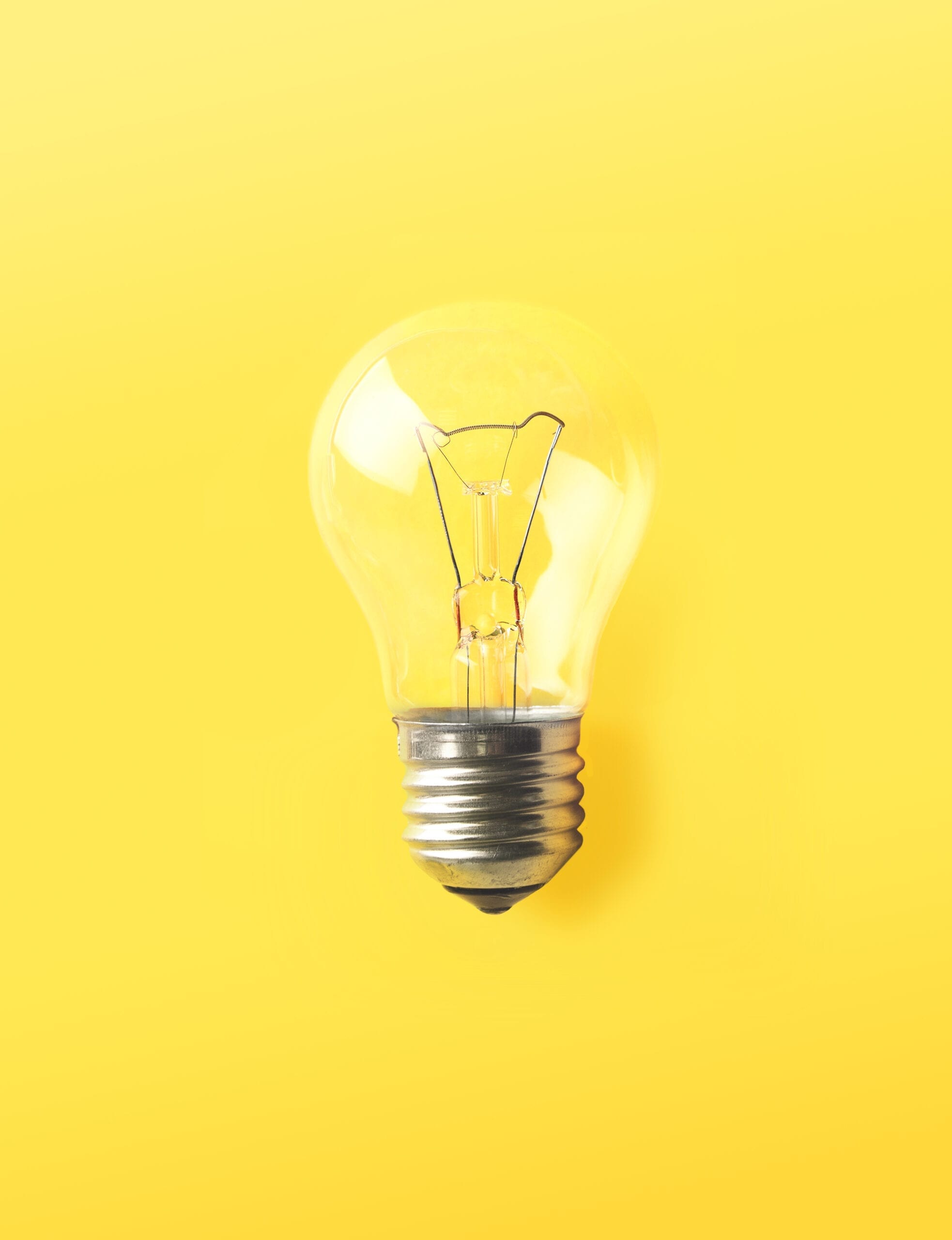 3d ligt bulb on yellow background.